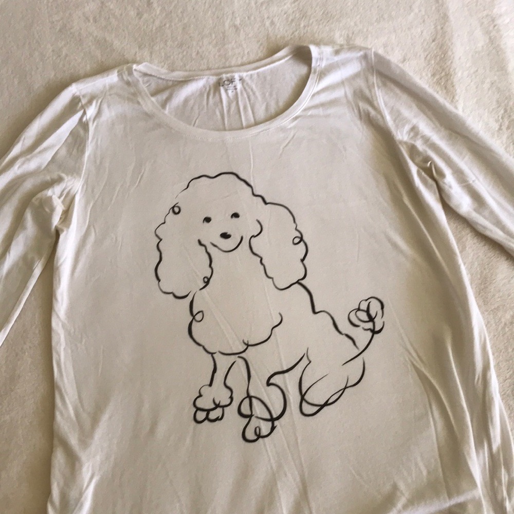 White shirt with a drawing of a cute dog